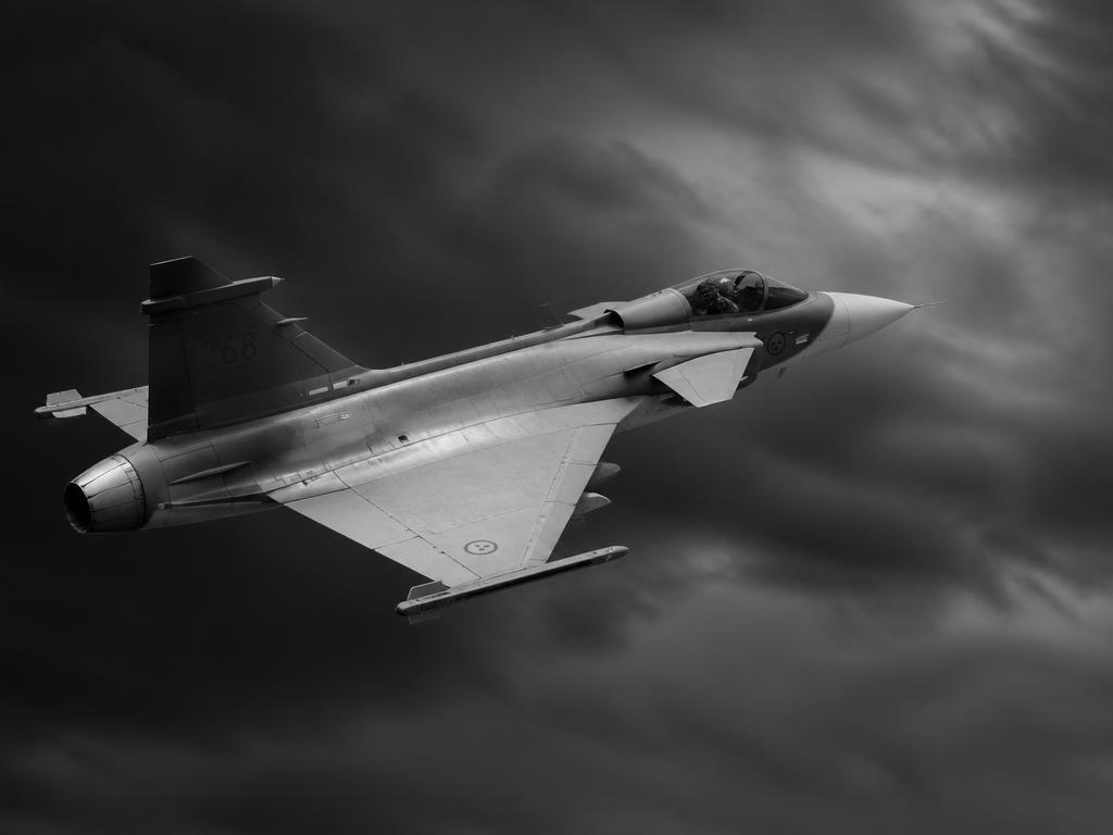 Avion de chasse militaire moderne en vol